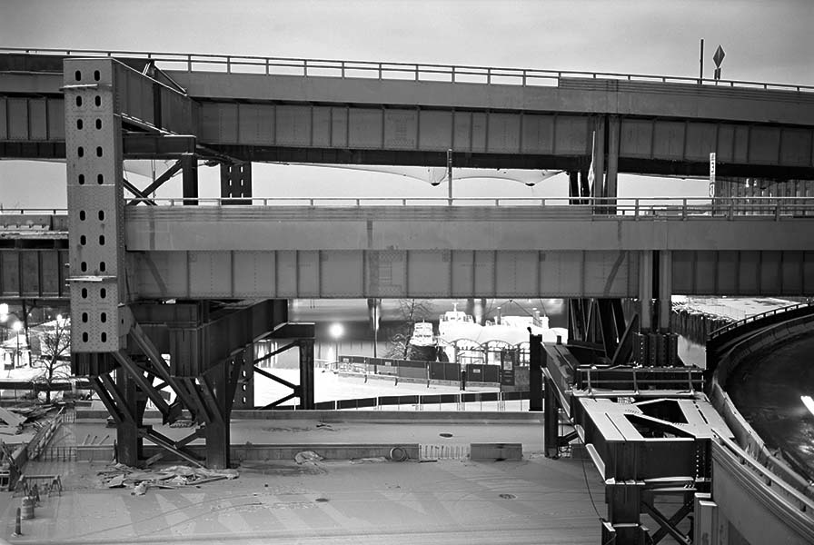 Boston Big Dig Near the Zakim Bridge Note temporary structures supporting old ramps during construction. Construction